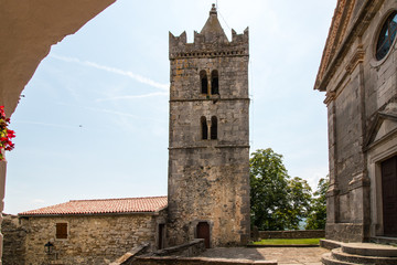 Fototapeta na wymiar Hum, Croatia - 29 July 2018: View of the church of the city of Hum in Croatia. Hum is known as the smallest city in the world.