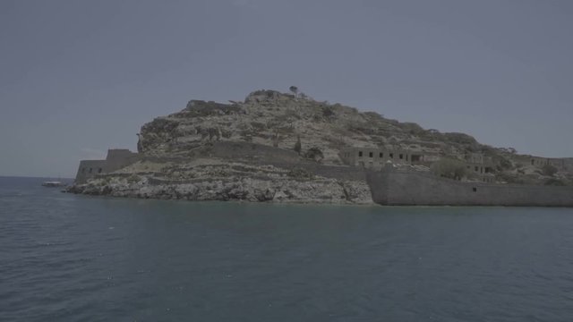 spinalonga island crete coast travelling on boat summer time greek holidays