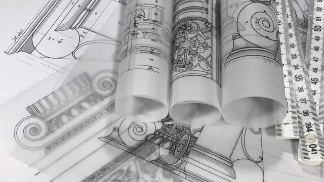 olls of blueprints - drawings of antique decorative elements of architectural orders / seamless looping	
