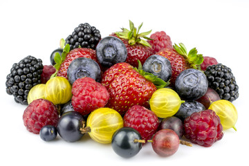 Varicoloured summer berries by close up on a white background.