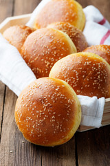 Fresh homemade burger buns with sesame.