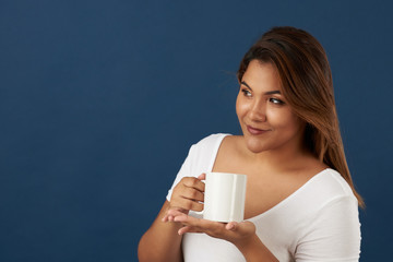 Latina woman with cup tea