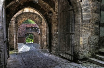 Fototapeta na wymiar Medieval archway and gate in Rothenburg ob der Tauber, Bavaria