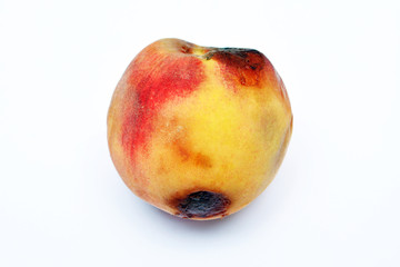 Fototapeta na wymiar mold growing on old peach, isolated on white background