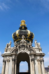 Fototapeta na wymiar Meeting point Kronentor, crown gate detail at baroque Zwinger palace in Dresden, Germany, sunny day blue sky background
