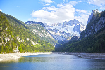 Naklejka na ściany i meble Colorful summer panorama of Vorderer ( Gosausee ) lake with Dachstein glacier on background. Splendid day view of Austrian Alps, Upper Austria, Europe.