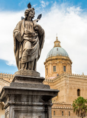 Fototapeta na wymiar Statue of San Cristina around the Cathedral of Palermo, Italy 