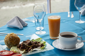 bolon and meat in a restaurant