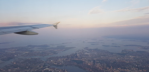 Aerial view of the city of Boston from the window if a plane. Wing