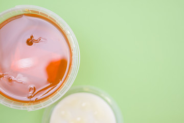 sugar paste or wax honey for hair removing, top view. copyspace - depilation and beauty concept