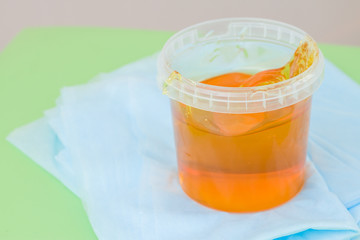 sugar paste or wax honey for hair removing - depilation and beauty concept