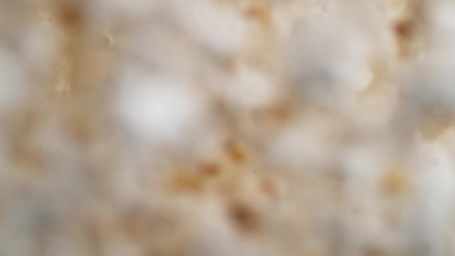 Camera follows popcorn jumping. Shot with high speed camera, phantom flex 4K. Slow Motion.