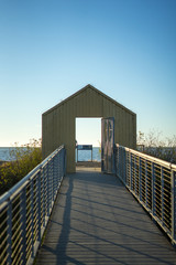 Obraz premium sunset in Alviso Marina County Park with door in there