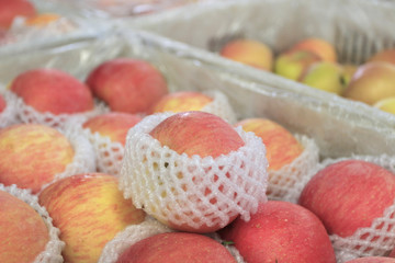 Fruit basket filled with apples in the fruit market