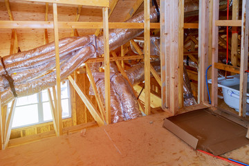 home construction with fragment of a ventilation system in a frame house