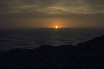 Amazing sunset over coast line in Lima Peru