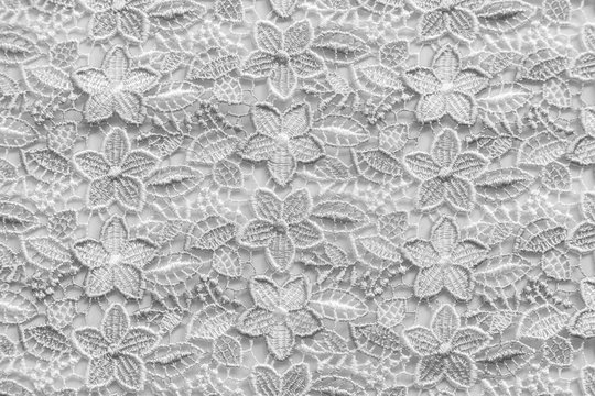 White lace with small flowers. No any trademark or restrict matter in this photo.