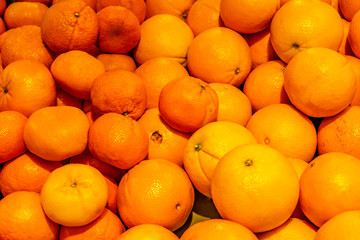 big and small oranges as background