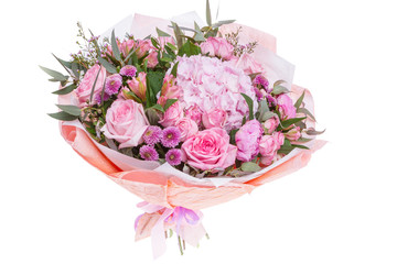 Bright buketny composition from fresh flowers, the white isolated background