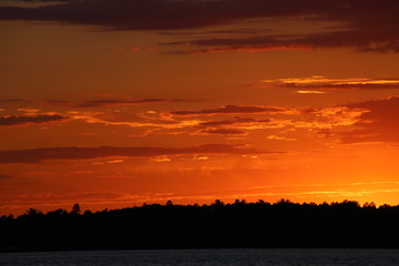 Fototapeta premium Sunset on a northern Minnesota lake in July