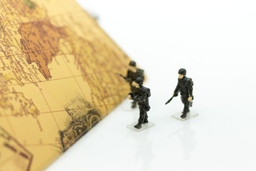 Soldiers walking on the country map, duty keeping the people and the country.