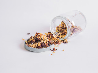 Glass jars with various grains, oats, linseed, dry seasoning