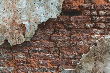 Brick wall with plaster background. Old vintage texture