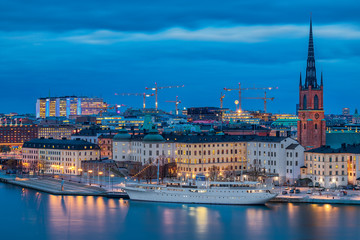 Sunset view onto Stockholm old town Gamla Stan and Riddarholmen church in Sweden