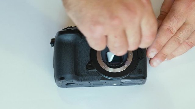 Cleaning the camera matrix. dust on the matrix. dirt on the sensor. sensor cleaning. photosensitive matrix.