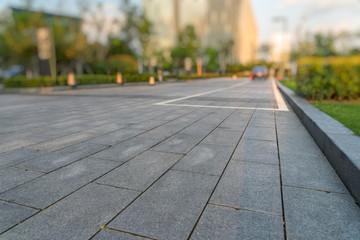 modern buildings and empty pavement in china.