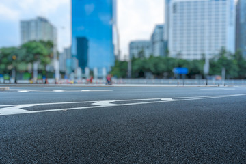 Obraz premium empty road and modern office block buildings against sky, china