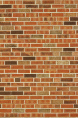 Vintage brown multi-tone brick wall background with Flemish stretcher bond brickwork pattern