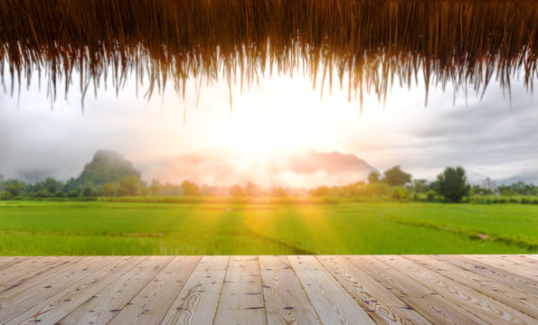 Perspective Wooden Board Empty Table Texture In Front Of Blurred Beautiful Nature With Rice Field Background For Product Montage Mock Up Scene.