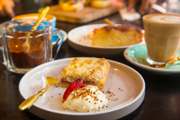 Delicious cheesecake with coconut on a plate. Breakfast and dessert