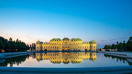Belvedere Palace with reflection at night in Vienna city, Austria. - obrazy, fototapety, plakaty