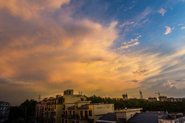 Peculiar beautiful sunset cloudscape and hilltop town in summer in Chongqing, China