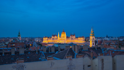 Budapest city skyline with view of Pest bank of Danube River in Budapest city, Hungary at night