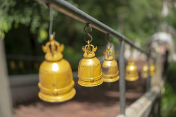 The bells of the temple are in the middle of the way up to the bell.