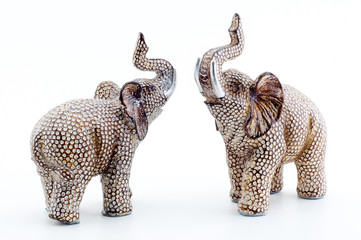 Bronze statuette of elephant isolated on white background