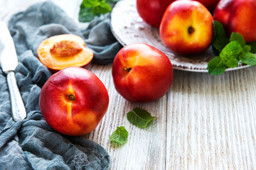 Plate with fresh nectarines