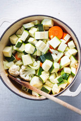 Uncooked vegetable soup with cauliflower courgette, carrots