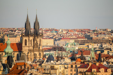 Scenic spring sunset aerial view of the Old Town pier architecture and Charles Bridge over Vltava...