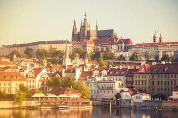 Fototapeta premium Scenic spring sunset aerial view of the Old Town pier architecture and Charles Bridge over Vltava river in Prague, Czech Republic