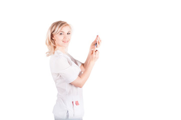 A female doctor in a white medical suit is holding ampoules for injections, a syringe for injections. Doctor isolated on white background with objects for injections