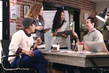 Group of businesspersons in creative business discussing work in the office