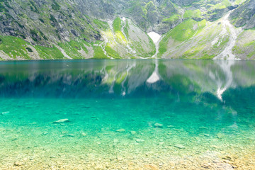 amazing Black Pond (polish: czarny staw) in Zakopane, High Tatra mountains, Poland © lukaszimilena