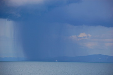 Seascape and a shower on a boat in Koh Phangan in Thailand