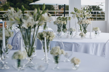 A very nicely decorated wedding table with plates, serviettes and signs. Scandinavian style. Sample and clean.