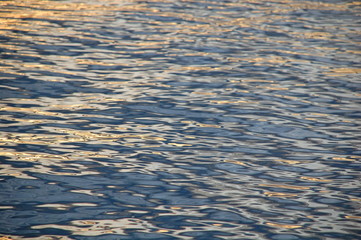 Sea waves at sunset at a beach in Koh Phangan in Thailand