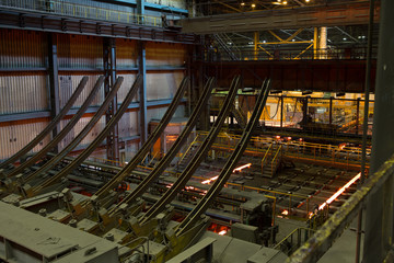 Hot square steel bloom on the roll-table